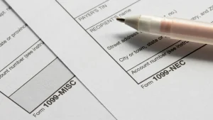 IRS form with a pen sitting on top of it 