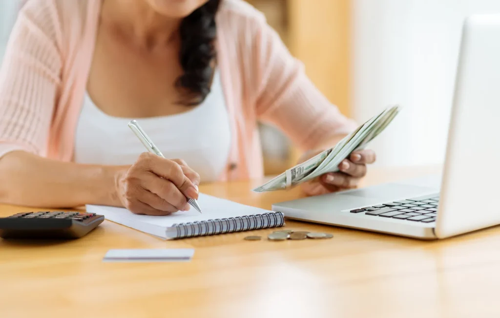 woman creating budgeting categories for her 2026 budget